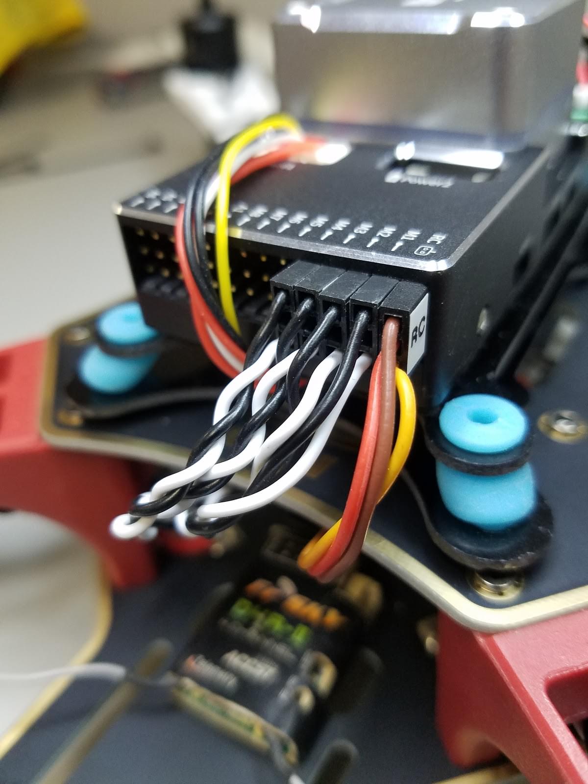 Attach peripherals to flight controller